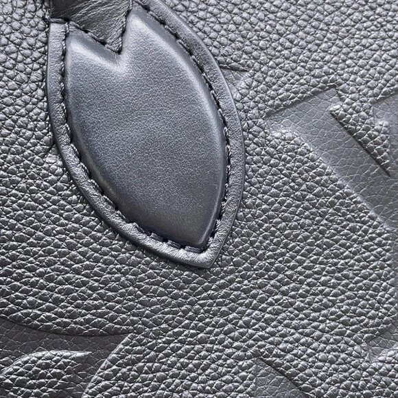 LOUIS VUITTON OnthegoEW Monogram Empreinte Leather Noir M23640 - Picture 7 of 15